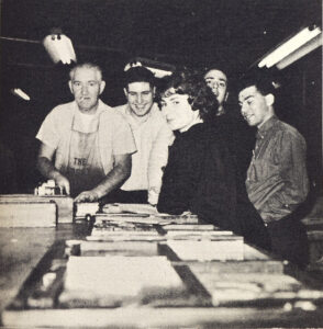 1964 Ticker staff at printer.